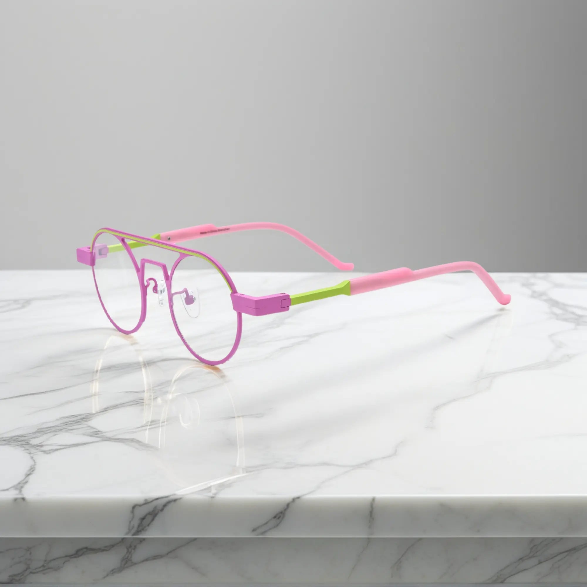 Side profile showing the slim titanium arms and hinge structure in Candy Lime color-block titanium frame with pink-green tones, part of the NeoPilot series